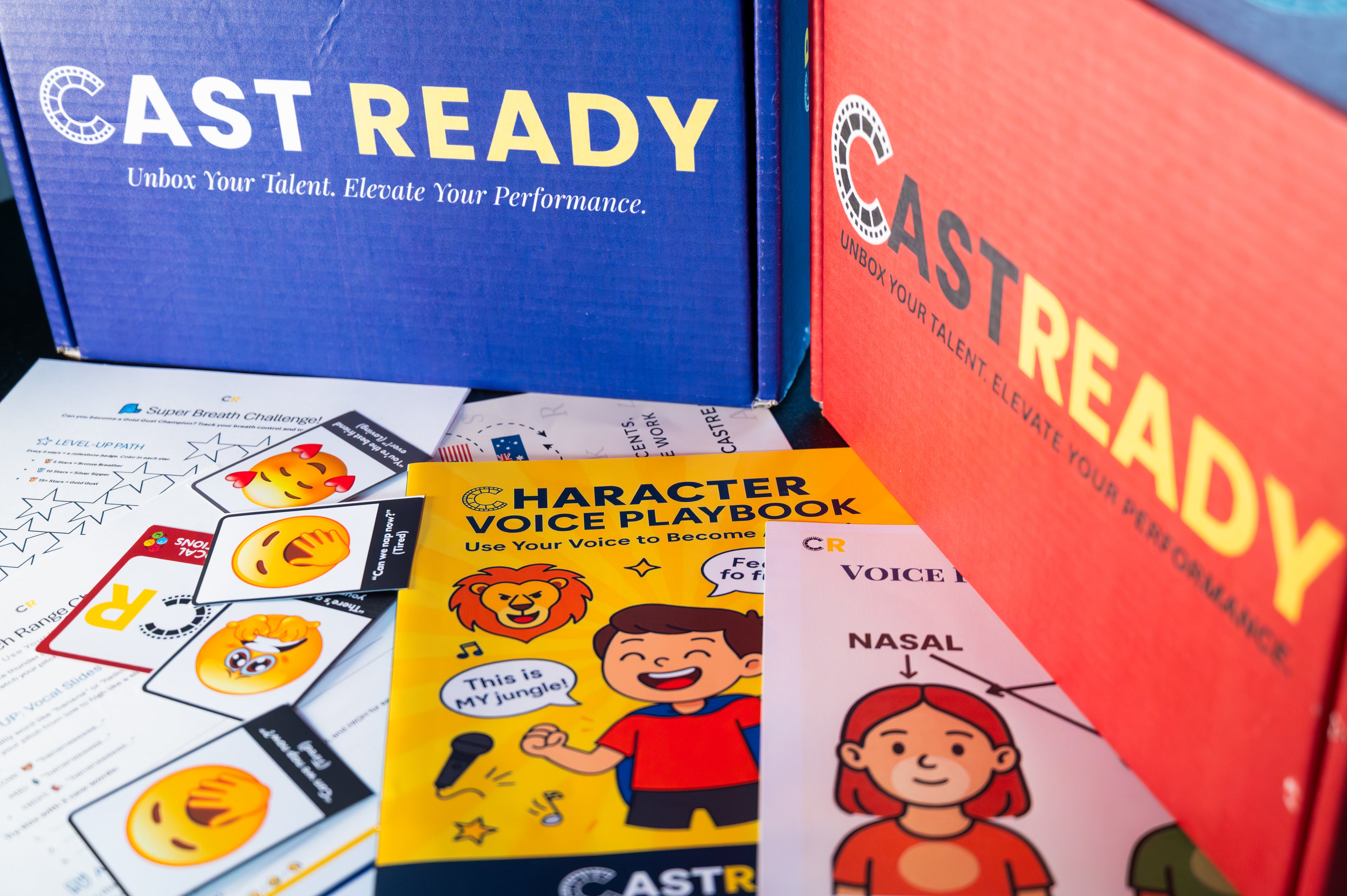 Close-up of CastReady acting education kit with colorful playbooks, activity cards, and skill-building materials for kids and teens