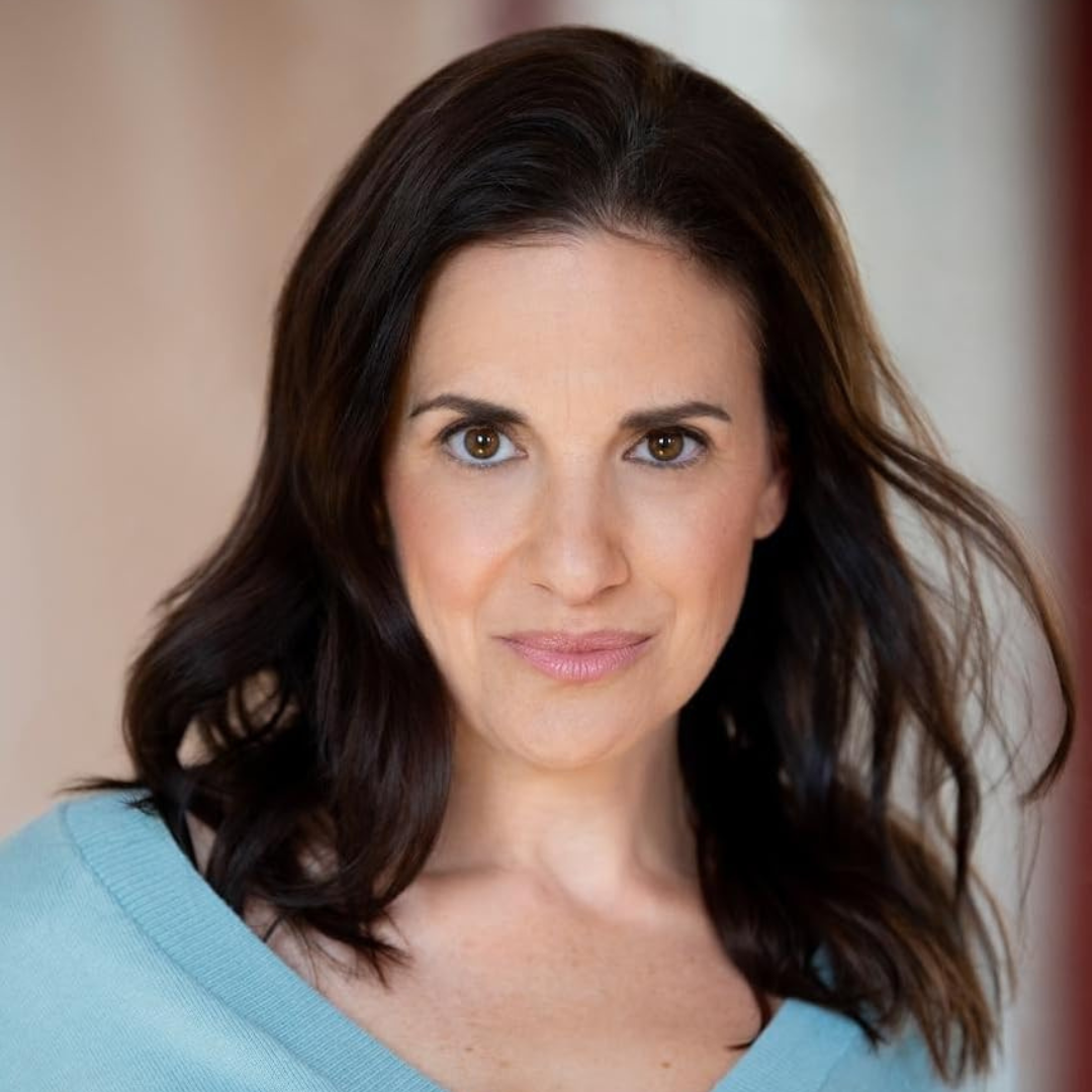 Jennifer Salvucci, acting coach and CastReady partner, smiling in a light blue sweater